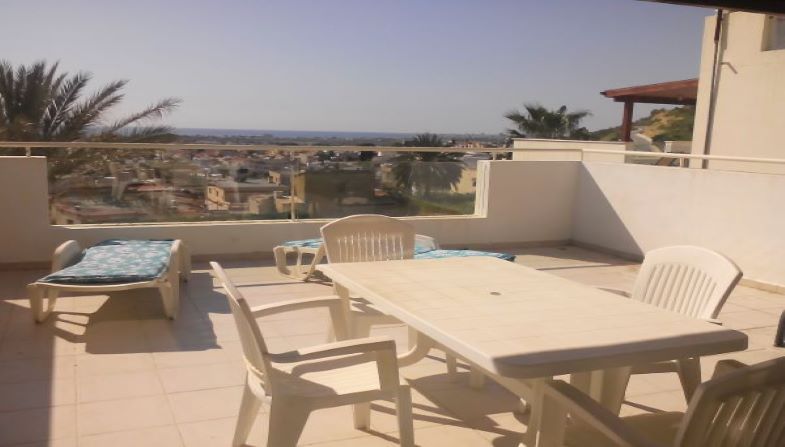 Bright flat with large patio and amazing full seaviews